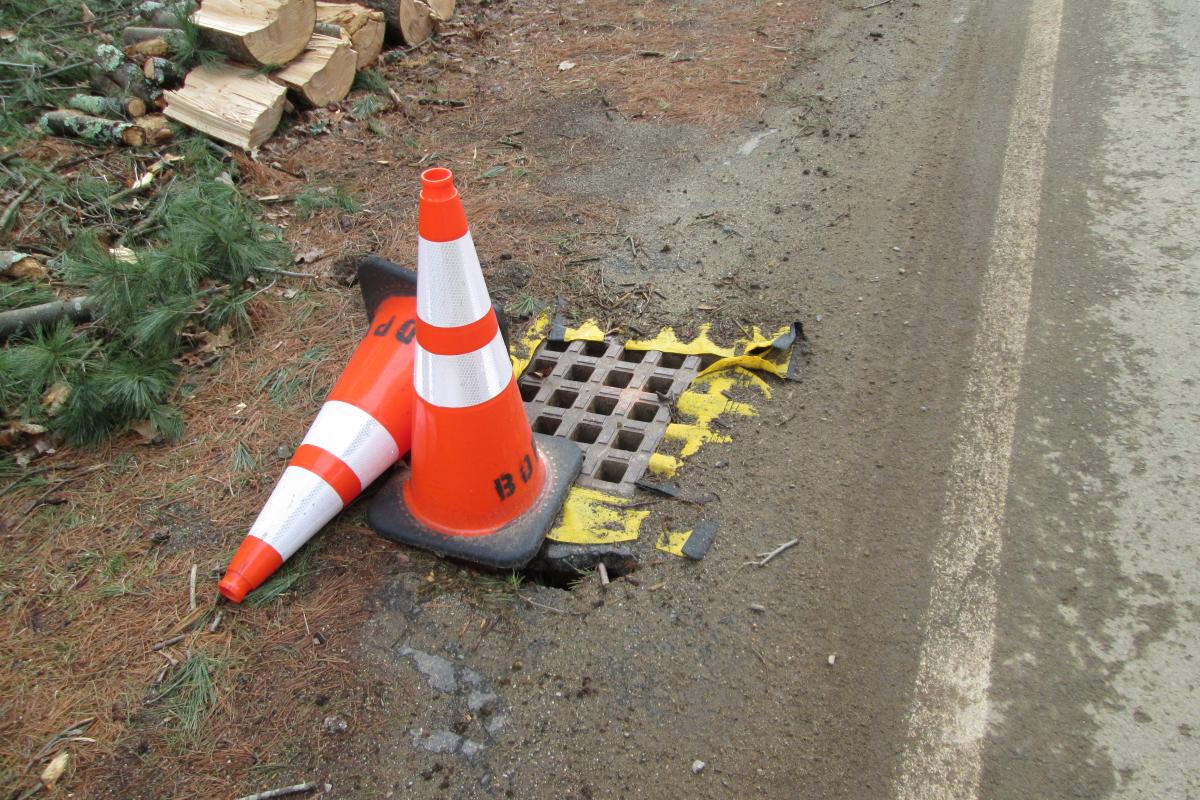 Photo of plastic cones on shuolder of road